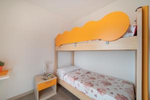 Postel nebo postele na pokoji v ubytování Residenza Monica