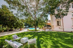 Bazén v ubytování Hotel Parco delle Fontane nebo v jeho okolí