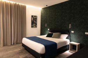 Postel nebo postele na pokoji v ubytování Porta Vetere - Boutique Rooms