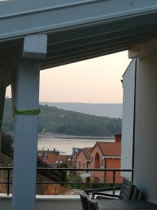 a view of the ocean from a house balcony at FRANTA in Cres