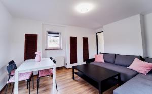Posezení v ubytování Domki Nad Stawami Apartament