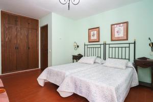 Postel nebo postele na pokoji v ubytování Hotel Marqués de Torresoto by Vivere Stays