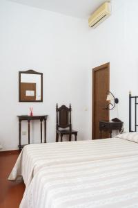 Postel nebo postele na pokoji v ubytování Hotel Marqués de Torresoto by Vivere Stays