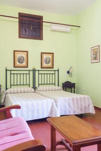 Postel nebo postele na pokoji v ubytování Hotel Marqués de Torresoto by Vivere Stays