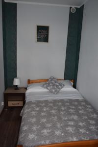 Postel nebo postele na pokoji v ubytování Apartament Ponitce do Węża - Kołobrzeg
