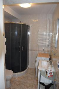 Koupelna v ubytování Apartament Ponitce do Węża - Kołobrzeg