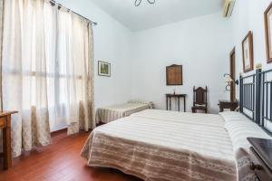 Postel nebo postele na pokoji v ubytování Hotel Marqués de Torresoto by Vivere Stays