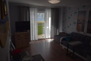 TV a/nebo společenská místnost v ubytování Apartament Ponitce do Węża - Kołobrzeg
