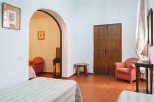 Postel nebo postele na pokoji v ubytování Hotel Marqués de Torresoto by Vivere Stays