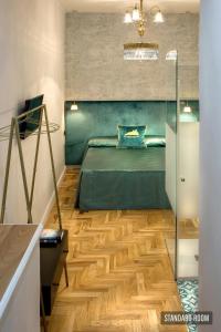 A bed or beds in a room at La Casa Sul Nilo