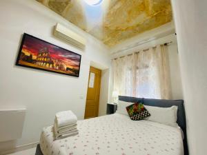 Postel nebo postele na pokoji v ubytování I Dormienti