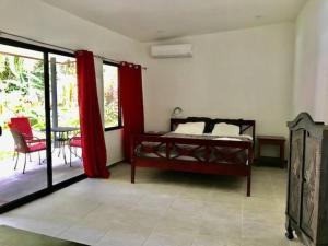 Postel nebo postele na pokoji v ubytování Villas la Foresta