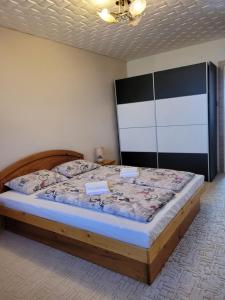 Postel nebo postele na pokoji v ubytování Apartmán Ellie Vysoké Tatry