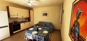 Köök või kööginurk majutusasutuses Via Ugento Apartments - GiHome