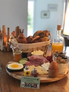 Opțiuni de mic dejun disponibile oaspeților de la Le Paradis des Gen(t)s