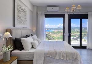 Postel nebo postele na pokoji v ubytování Soleado Luxury Villas