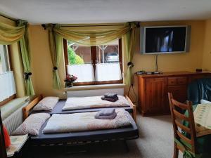 Postel nebo postele na pokoji v ubytování Ferienwohnung Sylvia-Marie