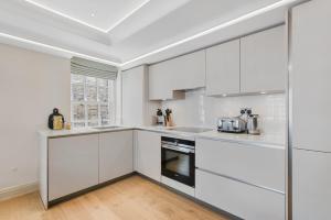 Hope House Residences by Aeria Apartments tesisinde mutfak veya mini mutfak