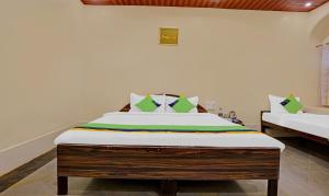 Treebo Cecil Resort, 600 Mtrs From Matheran Railway Station客房内的一张或多张床位