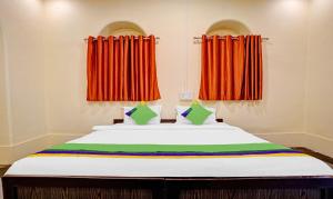 Treebo Cecil Resort, 600 Mtrs From Matheran Railway Station客房内的一张或多张床位