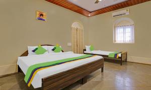 Treebo Cecil Resort, 600 Mtrs From Matheran Railway Station客房内的一张或多张床位