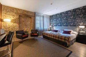 Cama o camas de una habitación en Castilla Termal Burgo de Osma
