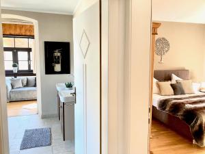 Część wypoczynkowa w obiekcie STADTVILLA BELLE KITZ im Zentrum mit Sauna by Belle Stay