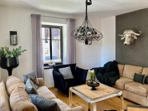 Część wypoczynkowa w obiekcie STADTVILLA BELLE KITZ im Zentrum mit Sauna by Belle Stay