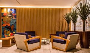 Uma área de estar em Hotel Morada do Sol mais 37 fotos