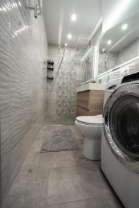 Kúpeľňa v ubytovaní Ideal Apartments Grobla + 6 fotografií