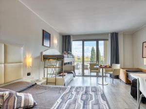 Voodi või voodid majutusasutuse Parc Hotel toas