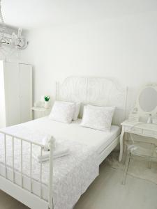 מיטה או מיטות בחדר ב-M&M apartment & rooms