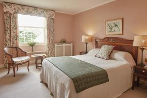 Кровать или кровати в номере The Arundell