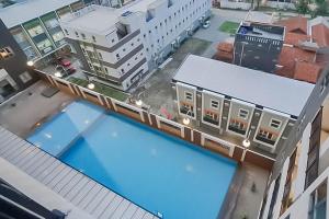 Kolam renang di atau dekat dengan RedLiving Apartemen Mekarwangi Square - Agus 2 Tower A