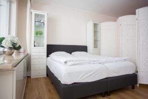 Un pat sau paturi într-o cameră la Apartment - Feldstrasse 30-O Winterberg