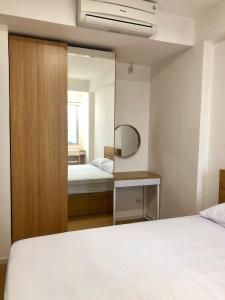 Ένα ή περισσότερα κρεβάτια σε δωμάτιο στο Zen Inspired 2-bedroom Apartment with Mountain City View