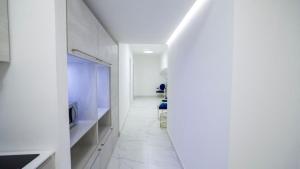 Televízia a/alebo spoločenská miestnosť v ubytovaní Albanèse Luxury Rooms