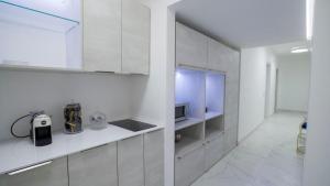 Kuchyňa alebo kuchynka v ubytovaní Albanèse Luxury Rooms + 11 fotografií