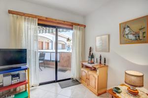 TV a/nebo společenská místnost v ubytování Apartamento Atlantic View