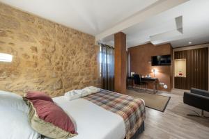 Cama o camas de una habitación en Castilla Termal Burgo de Osma