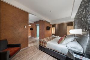 Cama o camas de una habitación en Castilla Termal Burgo de Osma