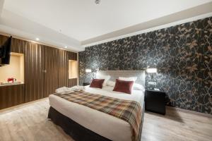 Cama o camas de una habitación en Castilla Termal Burgo de Osma