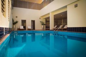 The swimming pool at or near Grand Villaggio Hotel Abu Dhabi
