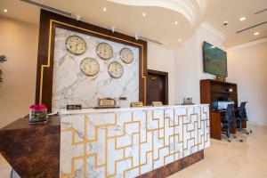 TV a/nebo společenská místnost v ubytování Grand Villaggio Hotel Abu Dhabi