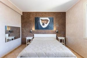 En eller flere senger på et rom på Calabernardo House