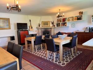 
a living room filled with furniture and a tv at Mar De Frisia in O Pino 
