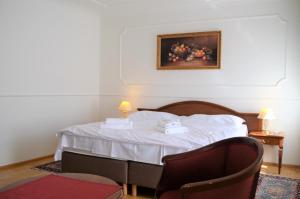 Łóżko lub łóżka w pokoju w obiekcie Hotel Renesance Krasna Kralovna