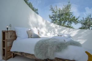 Maisons d'hôtes - Domaine Le Coq Enchanté客房内的一张或多张床位