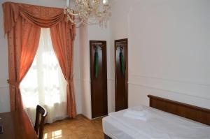 Łóżko lub łóżka w pokoju w obiekcie Hotel Renesance Krasna Kralovna