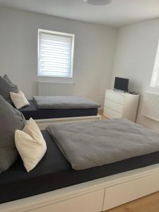 Postel nebo postele na pokoji v ubytování Apartment Obermichelbach
